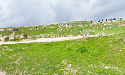 tourists in excavation area in ancient town Jerash