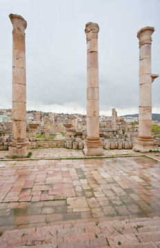 view through antique Artemis temple on modern Jerash