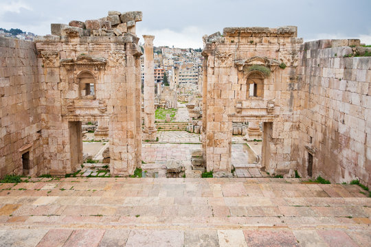 view through antique Artemis temple to modern Jerash