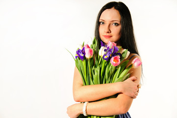 Spring portrait of a woman with tulips with blank space for text