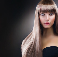 Beautiful Girl with Blond Hair. Healthy Long Hair