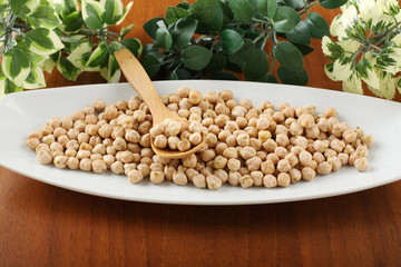 Raw chickpeas on dish