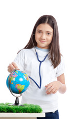 Fototapeta premium Girl with Stethoscope and Globe