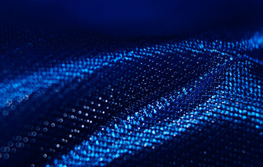 Blue abstract glossy textile background