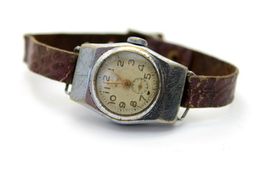The old watch on white background close-up