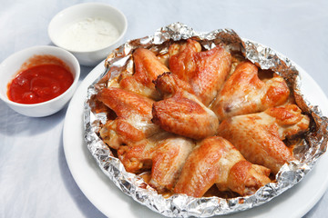 Chicken wings with sauce