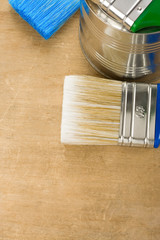 paintbrush and can on wood