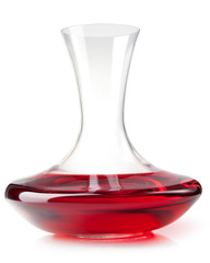 Red wine on a decanter isolated over white background.