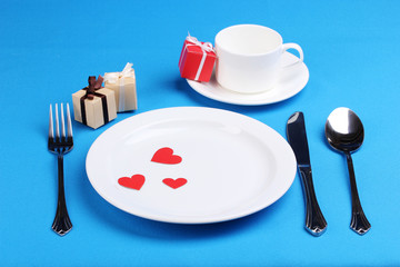 Table setting on blue background