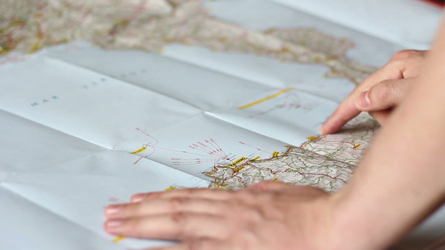 Man demonstrating at a route on a map