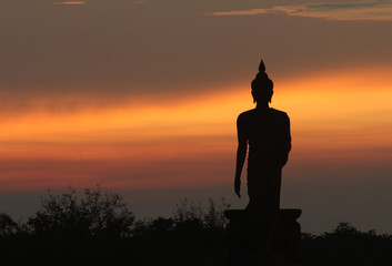 Silhouette of buddha statue