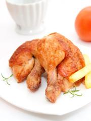 Roasted chicken drumsticks and vegetables