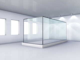Empty glass showcase in grey room with windows