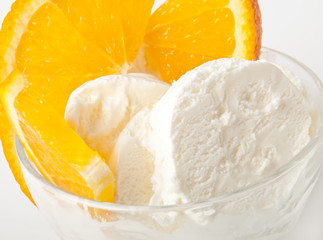Vanilla ice cream with orange slices