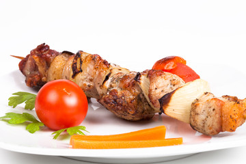 Shish kebab from pork with tomato