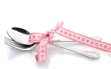 Fork, spoon and measuring tape isolated on white