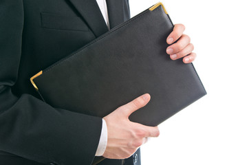 Man holding leather folder isolated on white