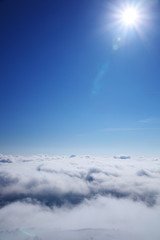 Sea of clouds and sun