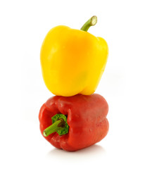 Red and yellow sweet pepper isolated on white background