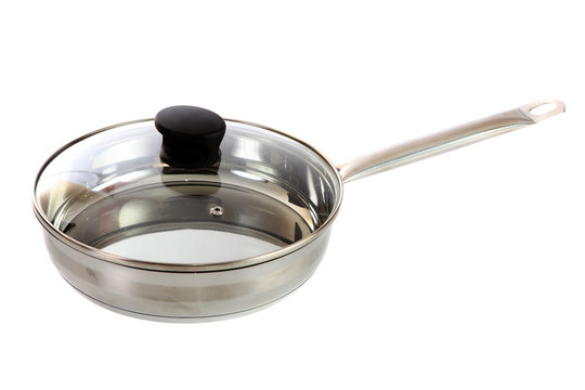 Steel frying pan , isolated.
