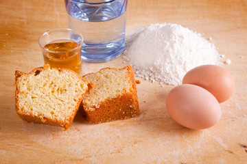 Slices of Cake with Raw Ingredients and Dessert Wine Glass