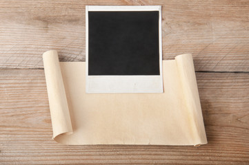 old paper on wood background