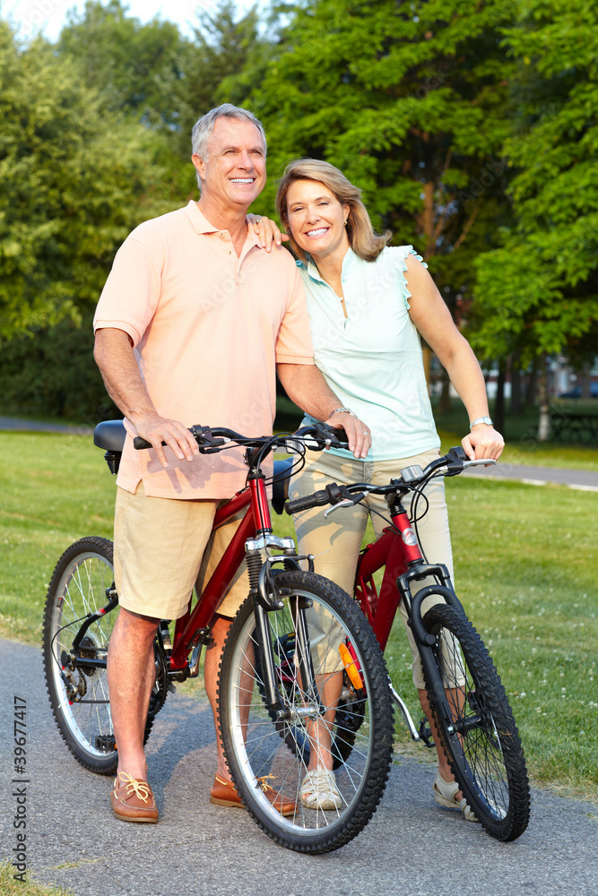 Canvas Prints Senior couple cycling.