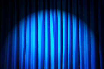 Brightly lit curtains in theatre concept