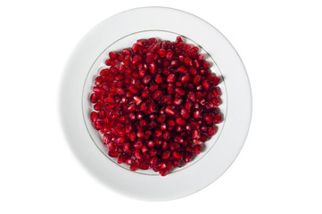 Тарелка с зёрнами граната