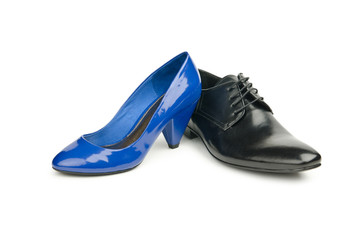 Male and female shoes on white