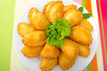 Patties stuffed with meat in the plate