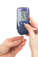 Diabetic patient measuring glucose level blood test
