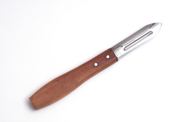 Alter Kartoffelschäler mit Holzgriff