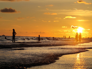 a background image of the beach at sunset