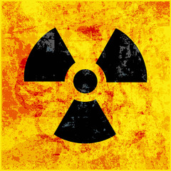 radioactivity symbol on grungy background - obrazy, fototapety, plakaty