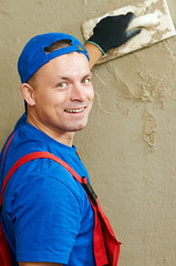 Plasterer at work