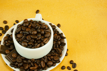 Cup full with coffee beans