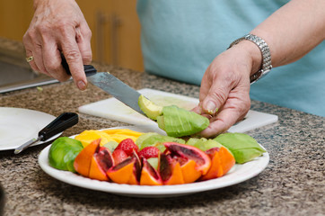 Senior asian filipino woman preparing food
