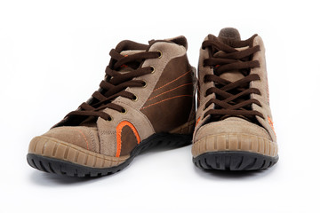 A pair of new hiking boots on white background