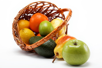 fruits in basket isolated on a white background.
