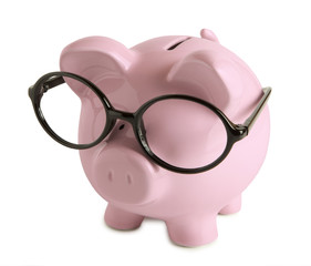 Piggy bank with glasses isolated