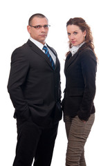 Serious looking businessman and business woman