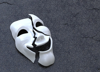 Cracked Mask on asphalt surface. Concept image