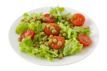 vegetable salad with peas on the plate