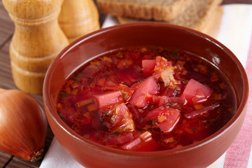 Russian cuisine. Borscht on the served table