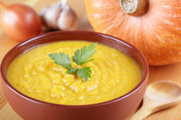 Pumpkin soup on the served table