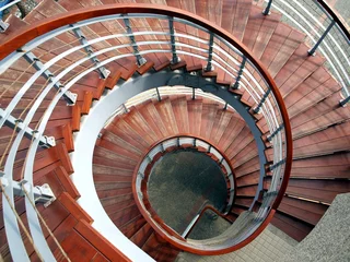 Fotobehang Spiraling Staircase Seen  From Above © Yali Shi