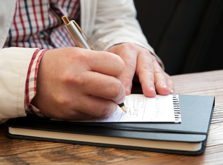 man writes