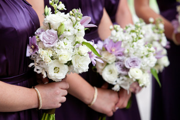 bridesmaid holding bouquet