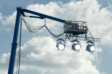 high powered spotlights illuminating a movie set